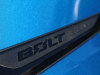 2022-chevrolet-bolt-euv-first-drive-exterior-bright-blue-metallic-027-bolt-euv-logo-on-headlight-assembly