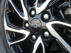 2022-chevrolet-bolt-euv-first-drive-exterior-bright-blue-metallic-035-wheel-detail-chevrolet-logo-on-wheel-center-cap-lug-nuts