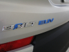 2022-chevrolet-bolt-euv-first-drive-exterior-silver-flare-metallic-016-bolt-euv-logo-badge-on-liftgate
