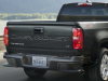 2021-chevrolet-colorado-lt-rear-three-quarters-004-tailgate-with-chevrolet-script-stamped