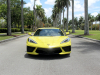 2021-chevrolet-corvette-stingray-coupe-3lt-accelerate-yellow-metallic-gma-garage-exterior-001-front-regular-angle