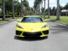 2021-chevrolet-corvette-stingray-coupe-3lt-accelerate-yellow-metallic-gma-garage-exterior-002-front-regular-angle