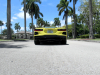 2021-chevrolet-corvette-stingray-coupe-3lt-accelerate-yellow-metallic-gma-garage-exterior-026-rear-low-angle
