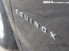 2021-chevy-equinox-lt-nightfall-gray-metallic-g7q-rental-gma-garage-exterior-027-equinox-logo-badge-on-front-door
