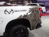 2021-chevrolet-silverado-1500-realtree-edition-exterior-017-realtree-logo-and-timber-pattern-on-bed-side-2020-chicago-auto-show