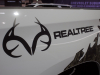 2021-chevrolet-silverado-1500-realtree-edition-exterior-019-realtree-logo-and-timber-pattern-on-bed-side-2020-chicago-auto-show