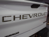 2021-chevrolet-silverado-1500-realtree-edition-exterior-022-chevrolet-logo-script-on-tailgate-in-timber-pattern-2020-chicago-auto-show