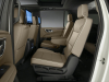 2021-chevrolet-suburban-premier-interior-009-second-row-captains-chairs-sliding-chairs