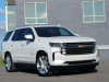 2021-chevrolet-tahoe-high-country-gma-garage-iridescent-pearl-tricoat-exterior-002-front-three-quarters