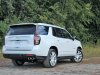 2021-chevrolet-tahoe-high-country-gma-garage-iridescent-pearl-tricoat-exterior-004-rear-three-quarters