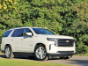 2021-chevrolet-tahoe-high-country-gma-garage-iridescent-pearl-tricoat-exterior-006-front-three-quarters