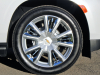 2021-chevrolet-tahoe-high-country-gma-garage-iridescent-pearl-tricoat-exterior-015-front-wheel