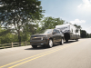 2021-chevrolet-tahoe-high-country-graywood-metallic-gs6-press-photos-exterior-023-front-three-quarters-towing