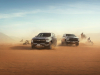 2021-chevrolet-tahoe-z71-middle-east-exterior-001-in-desert-with-bikes-and-atvs