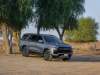 2021-chevrolet-tahoe-z71-middle-east-exterior-007-front-three-quarters-dirt-road