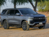 2021-chevrolet-tahoe-z71-middle-east-exterior-009-front-three-quarters-dirt-road