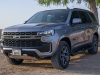 2021-chevrolet-tahoe-z71-middle-east-exterior-014-front-three-quarters-dirt-road