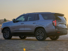 2021-chevrolet-tahoe-z71-middle-east-exterior-017-rear-three-quarters-dirt-road