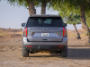 2021-chevrolet-tahoe-z71-middle-east-exterior-018-rear-end-dirt-road