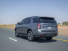 2021-chevrolet-tahoe-z71-middle-east-exterior-028-rear-three-quarters-road