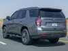 2021-chevrolet-tahoe-z71-middle-east-exterior-029-rear-three-quarters-road