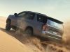2021-chevrolet-tahoe-z71-middle-east-exterior-035-front-three-quarters-desert-sand