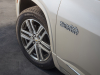 2021-chevrolet-traverse-high-country-exterior-014-wheel-and-high-country-logo