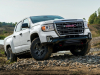 2021-gmc-canyon-at4-off-road-performance-edition-exterior-004-front-three-quarters-off-road