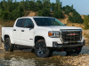 2021-gmc-canyon-at4-off-road-performance-edition-exterior-006-front-three-quarters-off-road-water