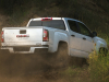2021-gmc-canyon-at4-off-road-performance-edition-exterior-009-rear-three-quarters-off-road