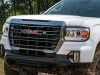 2021-gmc-canyon-at4-off-road-performance-edition-exterior-018-front-end-grille-gmc-logo-red-tow-hooks