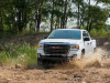 2021-gmc-canyon-at4-off-road-performance-edition-exterior-024-front-three-quarters-off-road-water