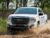 2021-gmc-canyon-at4-off-road-performance-edition-exterior-025-front-three-quarters-off-road-water