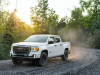 2021-gmc-canyon-at4-off-road-performance-edition-exterior-026-front-three-quarters-off-road