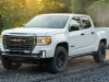 2021-gmc-canyon-at4-off-road-performance-edition-exterior-028-front-three-quarters-off-road
