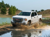 2021-gmc-canyon-at4-off-road-performance-edition-exterior-030-front-three-quarters-off-road-water