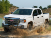 2021-gmc-canyon-at4-off-road-performance-edition-exterior-031-front-three-quarters-off-road-water