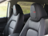 2021-gmc-canyon-at4-off-road-performance-edition-interior-004-front-seats-at4-logo-on-headrests