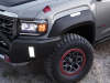 2021-gmc-canyon-at4-ovrlandx-concept-manufacturer-photos-exterior-050-front-three-quraters-headlamp-foglamp-17-inch-aev-crestone-beadlock-wheel-with-bf-goodrich-tire-fender-flare-with-task-light