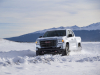 2021-gmc-canyon-at4-exterior-001-front-three-quarters-in-snow