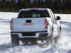2021-gmc-canyon-at4-exterior-010-rear-three-quarters-in-snow