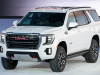 2021-gmc-yukon-at4-live-reveal-exterior-005-front-three-quarters-on-stage