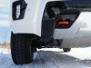2021-gmc-yukon-at4-summit-white-canada-gma-garage-exterior-047-front-end-unique-front-fascia-red-tow-hook-skid-plate-tire-fog-lamp
