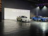 next-gen-nascar-chevrolet-camaro-north-carolina-debut-may-2021-exterior-001-on-stage-with-nascar-mustang-front-three-quarters