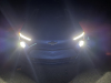 2022-chevrolet-bolt-ev-gma-garage-headlights-at-night-exterior-001-daytime-running-lights-and-primary-headlights