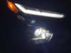 2022-chevrolet-bolt-ev-gma-garage-headlights-at-night-exterior-004-daytime-running-lights-and-primary-headlights