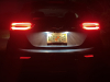 2022-chevrolet-bolt-ev-gma-garage-tail-lights-at-night-exterior-002-rear-accent-lights-and-reflectors