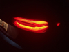 2022-chevrolet-bolt-ev-gma-garage-tail-lights-at-night-exterior-008-passenger-side-rear-accent-light-and-side-marker