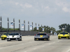 2022-chevrolet-corvette-stingray-imsa-gtlm-championship-c8-r-edition-exterior-005-reveal-macarthur-bridge-left-to-right-convertible-in-accelerate-yellow-metallic-c8-stingray-pacer-car-c8-r-coupe-in-ac