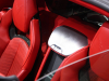 2023-chevrolet-corvette-c8-z06-coupe-3lz-adrenaline-red-dipped-interior-sema-2021-interior-002-overhead-view-waterfall-between-seats-with-z06-logo